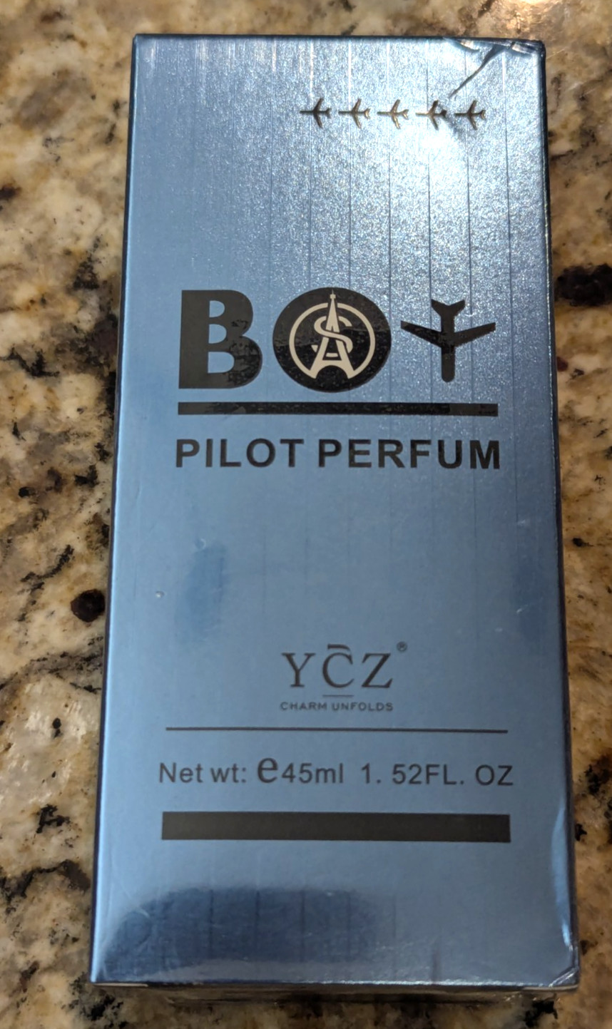 YCZ Charm Unfolds Boy Pilot Perfum 1.52 fl oz exp: 11/2030