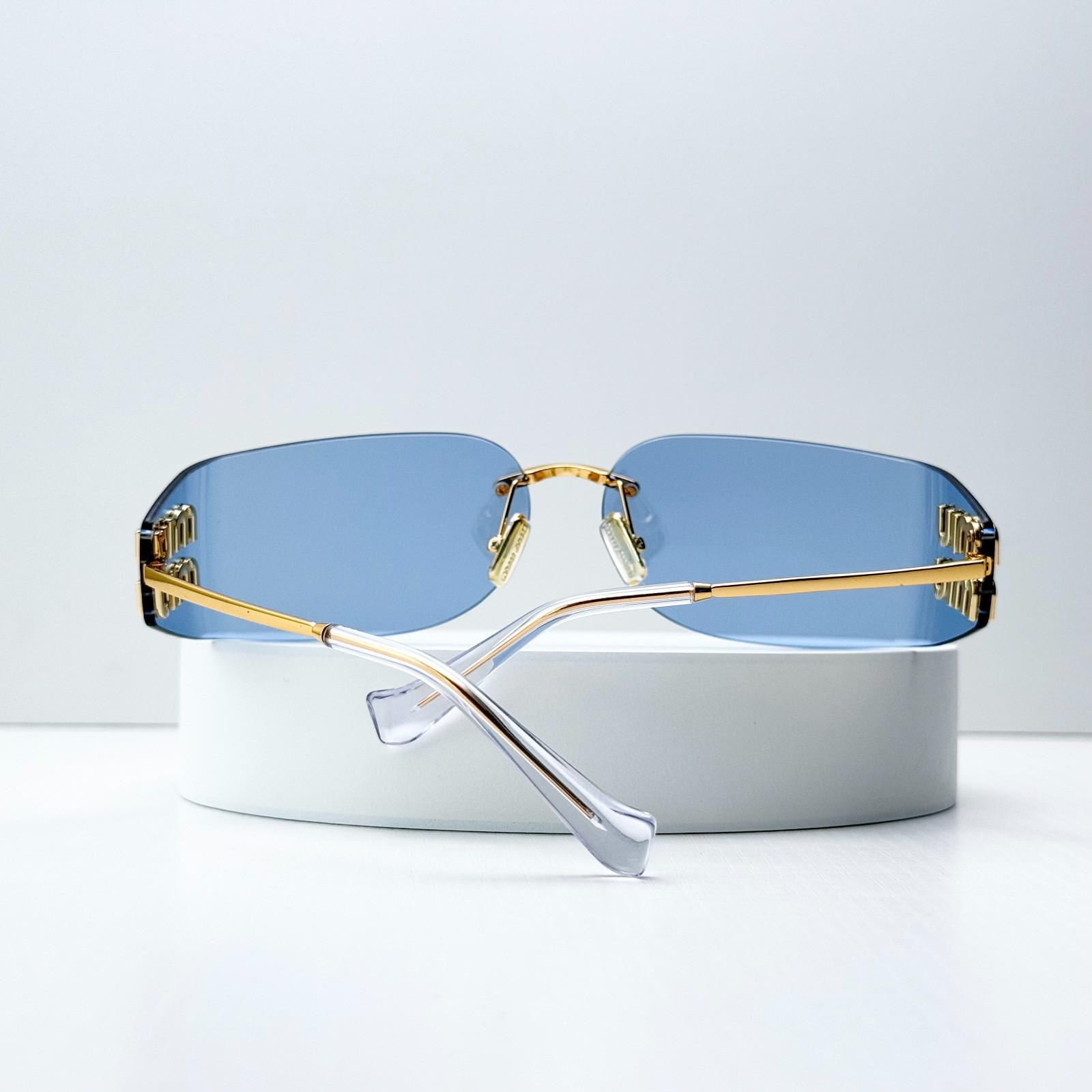 Miu Miu SMUA51 Gold Light Blue Rimless Wrap Sunglasses Women 75mm
