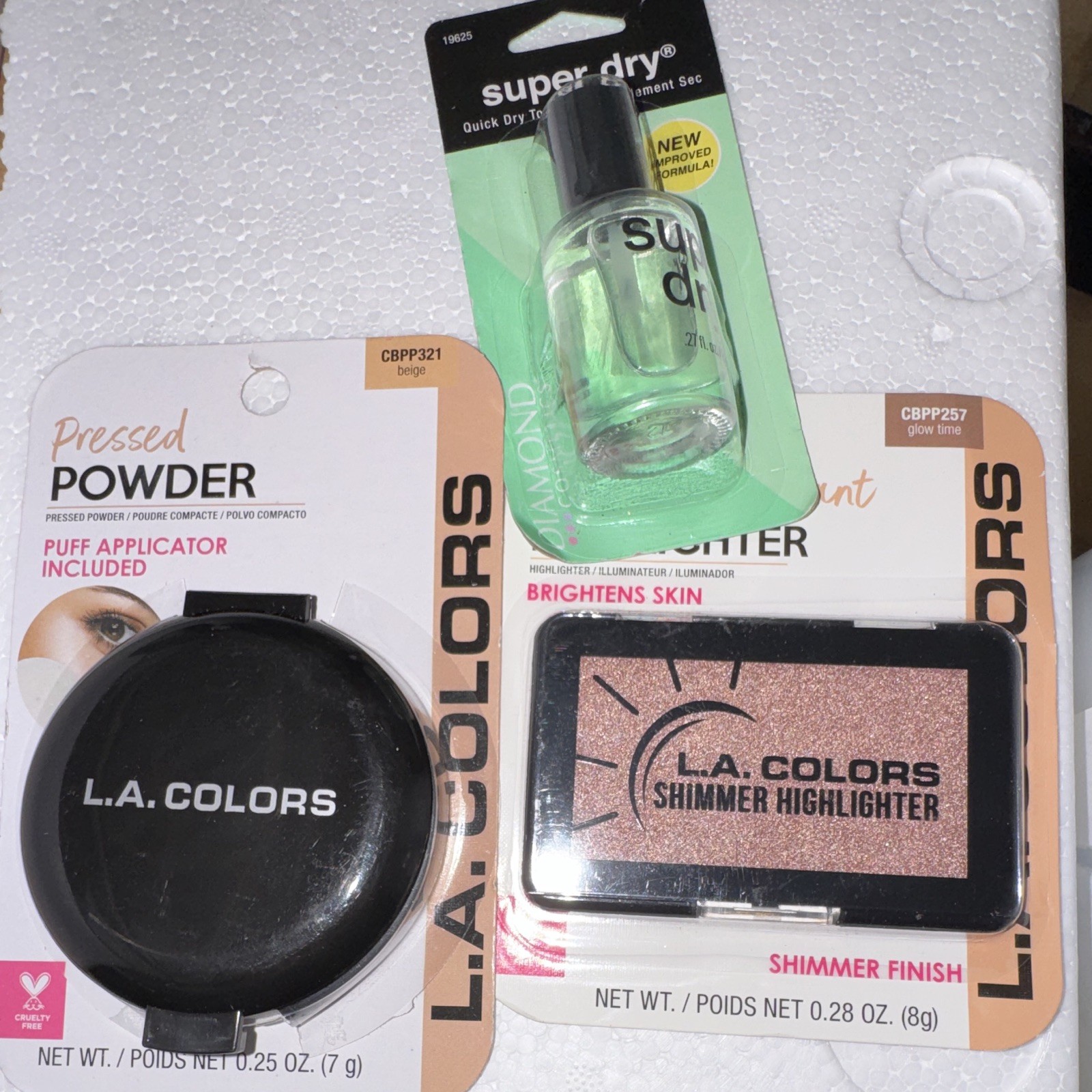 L.A. COLORS Cruelty-Free Full Size Lot: Pressed Powder + Highlighter + Top Coat